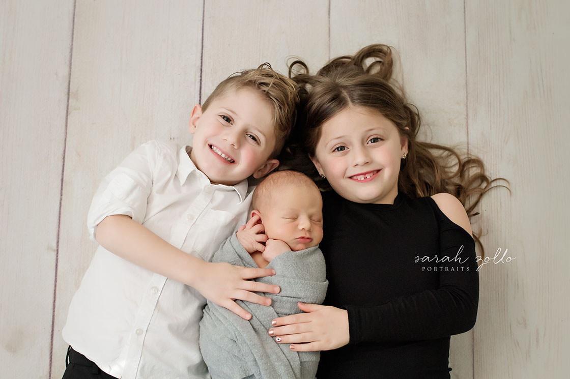 "Baby G's" Newborn Portraits - Newborn Photography - Newborn Photo Session | Warwick, RI - with siblings on floor