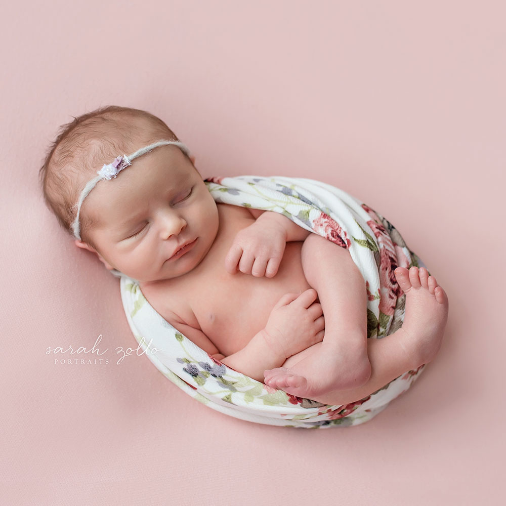 newborn photographers baby photography floral egg wrap