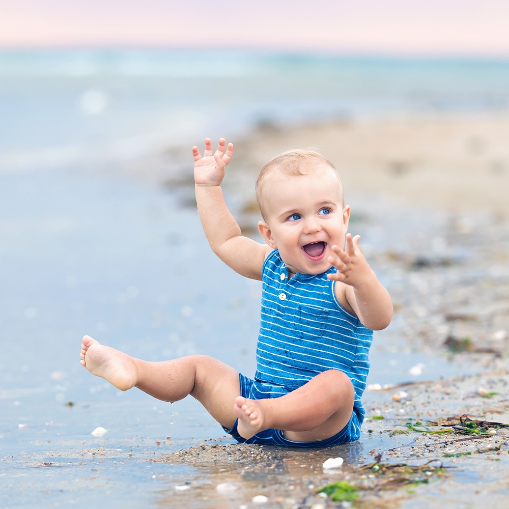 Cape Cod Family Photo Session | Woodneck Beach, Falmouth, MA - baby sitting on the beach playing in the water