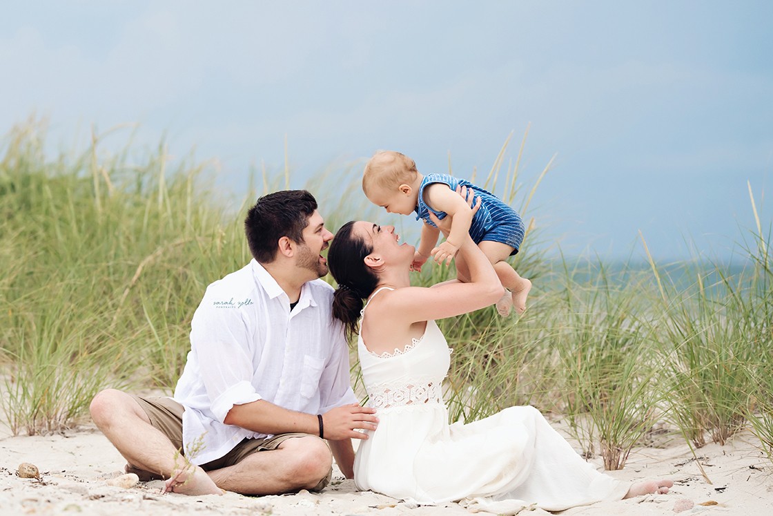 Cape Cod Family Photo Session | Woodneck Beach, Falmouth, MA - Family sitting with baby