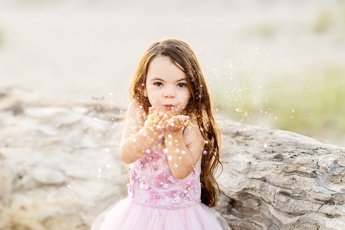 Beach Photography Watch Hill, Napatree Point, Westerly, RI - girl blowing glitter at camera