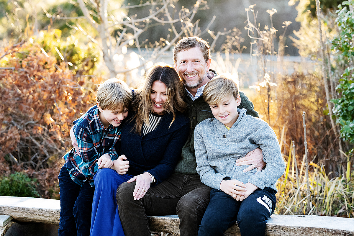 Fall Family mini Photo Session & Photography at "The Farmer's Daughter" in South Kingstown, RI - family sitting on fence