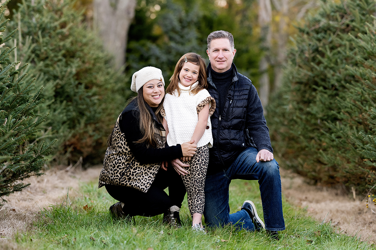 Family Photography and Photo mini Sessions at The Farmer's Daughter Tree Farm in South Kingstown, RI - family kneeling
