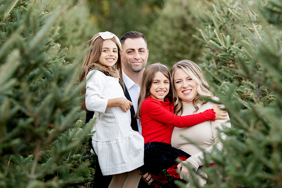 Family Photography and Photo mini Sessions at The Farmer's Daughter Tree Farm in South Kingstown, RI - family in trees