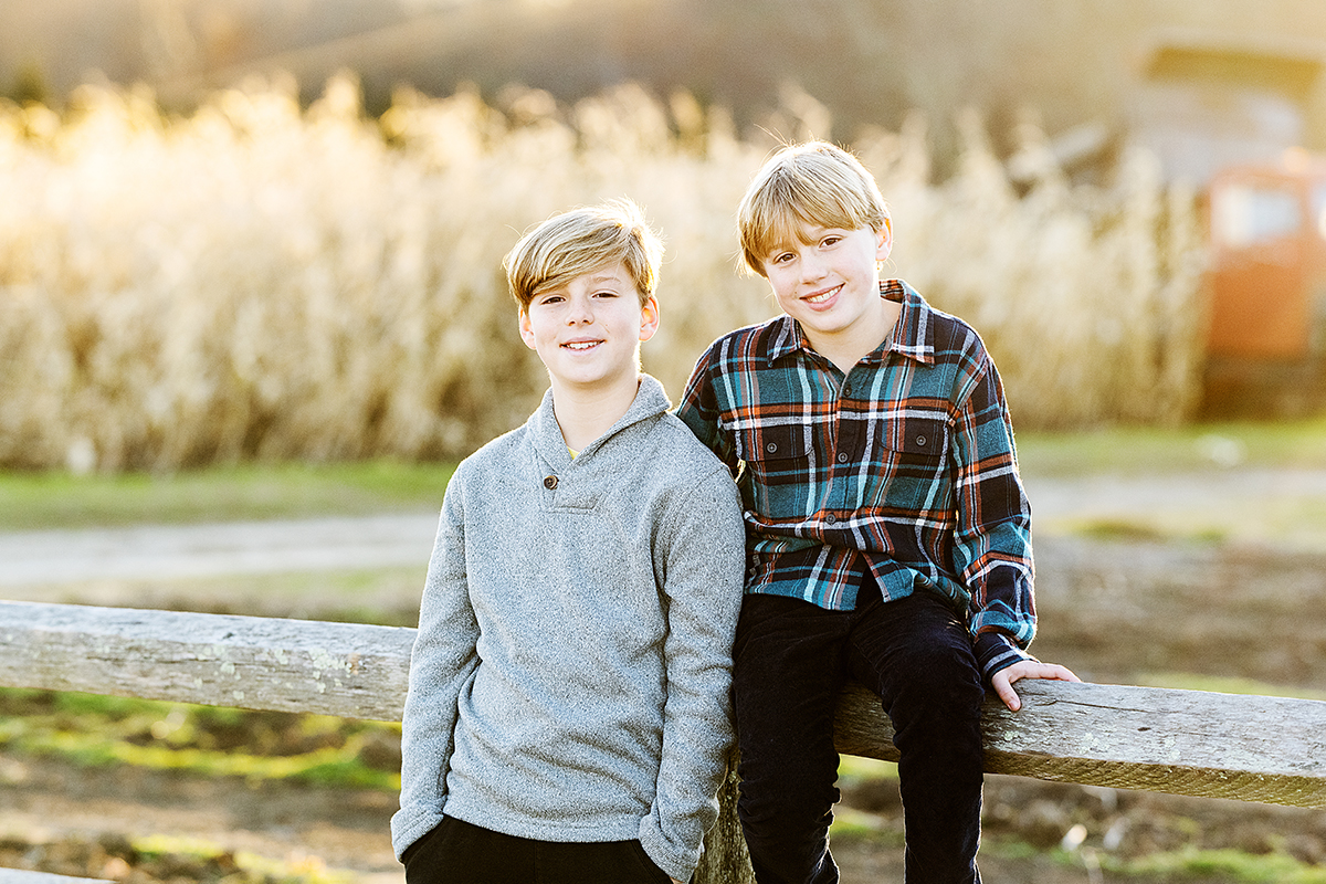 Fall Family mini Photo Session & Photography at "The Farmer's Daughter" in South Kingstown, RI - brothers on fence
