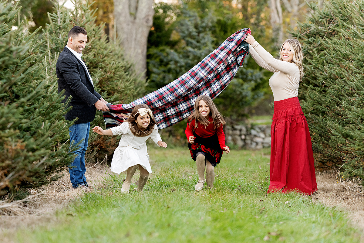 Family Photography and Photo mini Sessions at The Farmer's Daughter Tree Farm in South Kingstown, RI - family picnic blanket