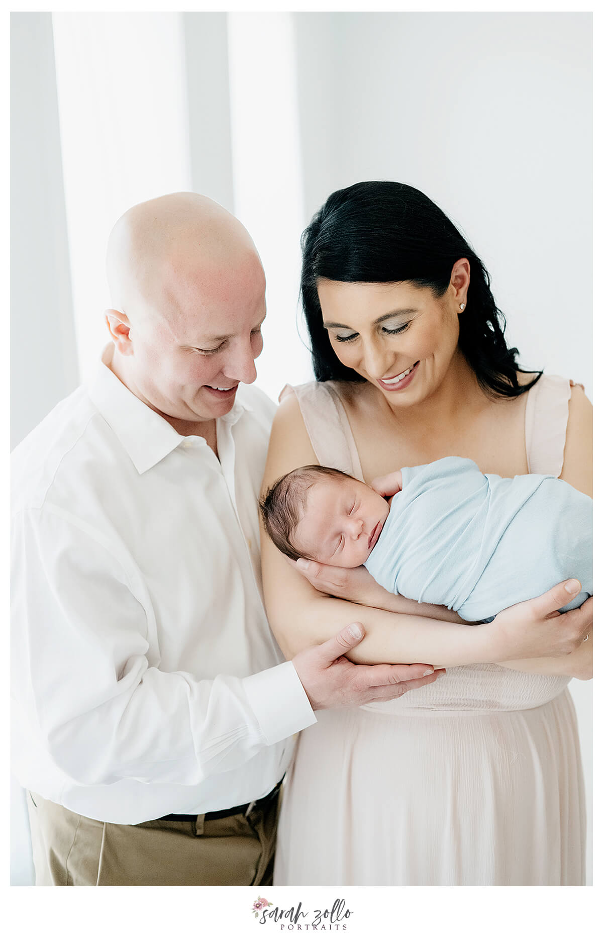 Richmond, RI Newborn Photography Studio and family photography studio. Mother and father with newborn.