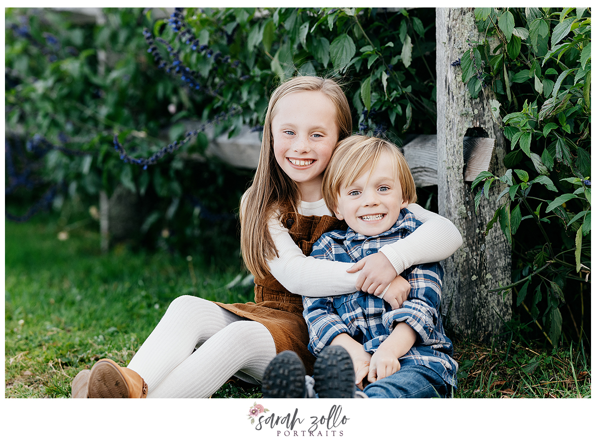 fall family photography sessions at the farmers daughter ri siblings hugging brother sister