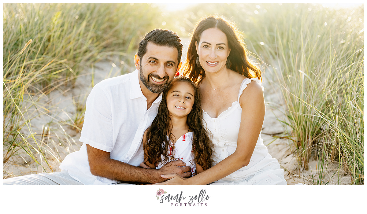 napatree point golden hour photo session with a family of 3
