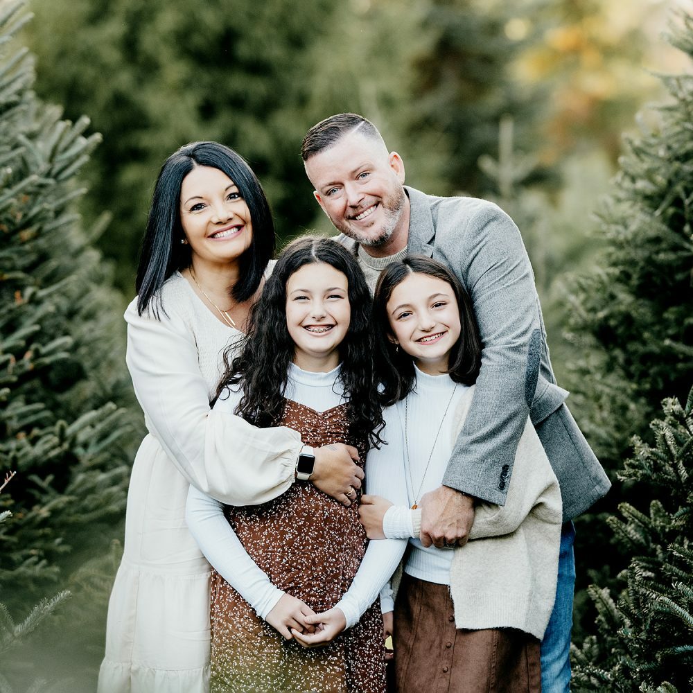 christmas family photo shoot with christmas trees in Rhode Island 2022 - sarah zollo portraits